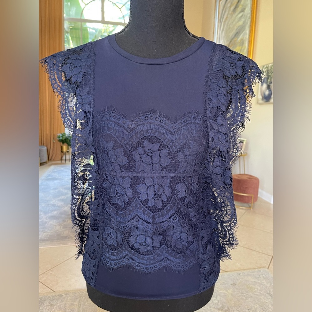 Top sleeveless lacy blue back see thru small